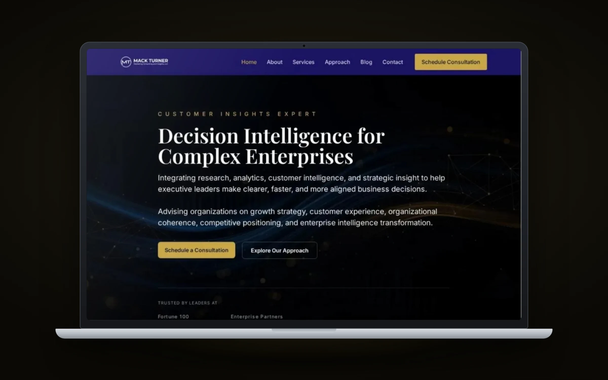 Mack Turner Marketing website design by Design Fly 24, shown on laptop and phone