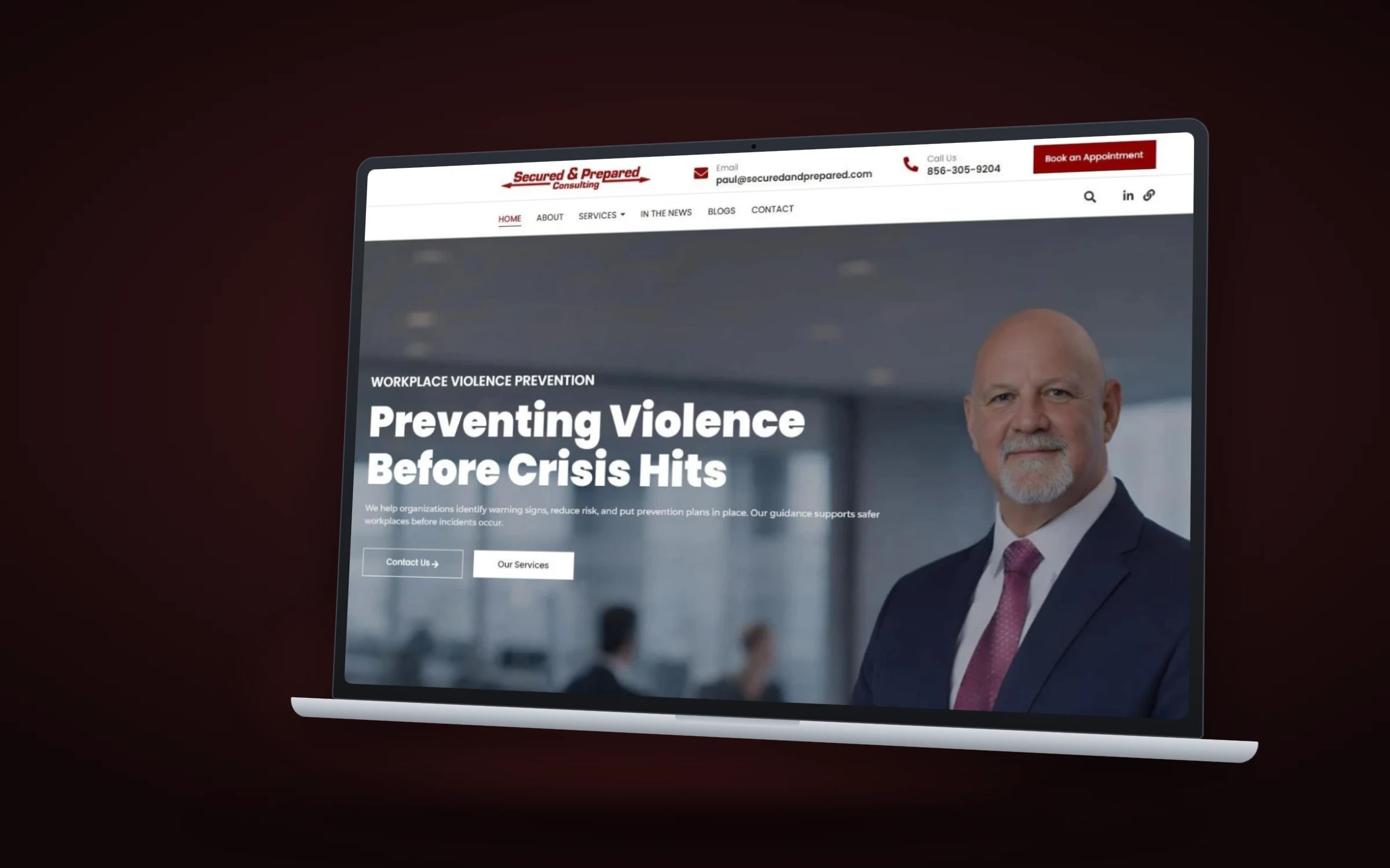 Secured and Prepared Consulting website design by Design Fly 24, shown on laptop